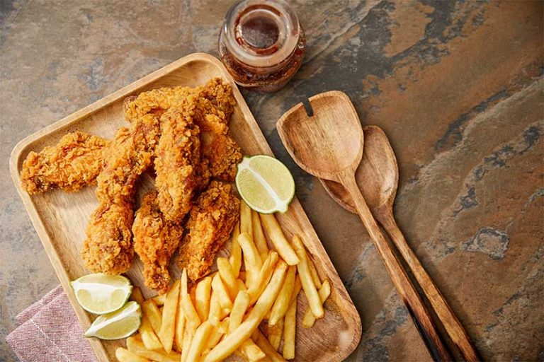 Top-view-wooden-board-delicious-chicken-nuggets-french-fries-lime Top-view-wooden-board-delicious-chicken-nuggets-french-fries-lime