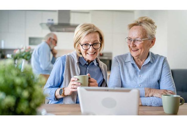 Two-mature-senior-caucasian-women-family-mother-daughter-sisters-friends