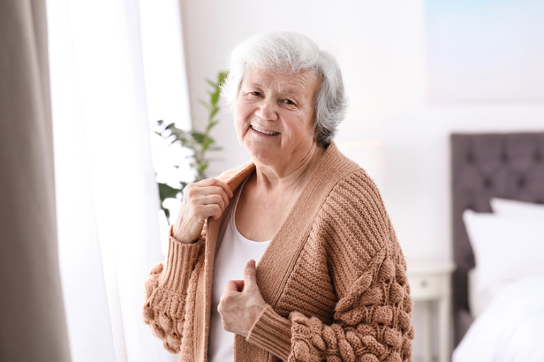 portrait-of-beautiful-grandmother-in-sweater portrait-of-beautiful-grandmother-in-sweater