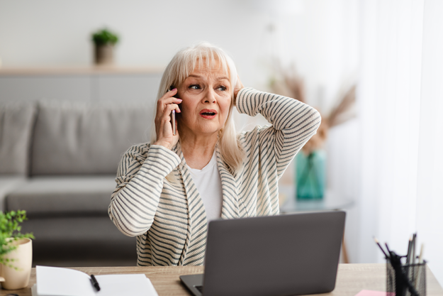 shocked-senior-woman-talking-on-mobile-phone shocked-senior-woman-talking-on-mobile-phone