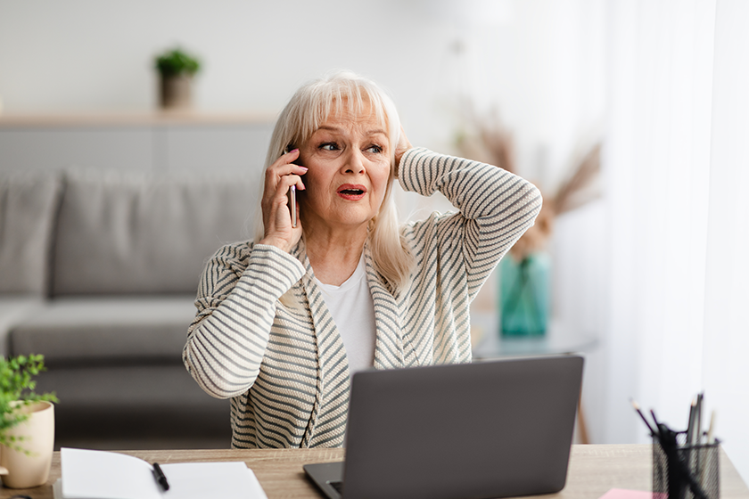 shocked-senior-woman-talking-on-mobile-phone shocked-senior-woman-talking-on-mobile-phone
