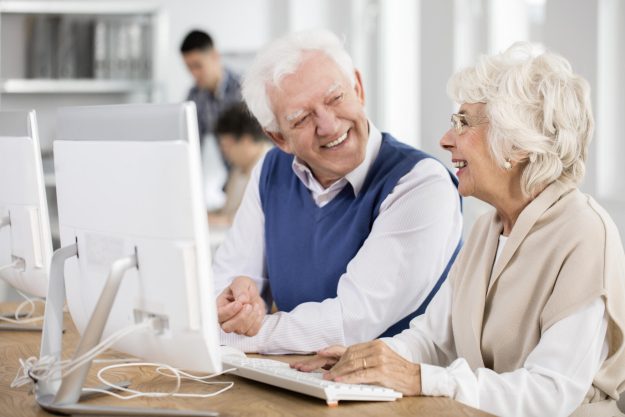 Two,Elders,Making,Friends,During,Group,Project,On,It