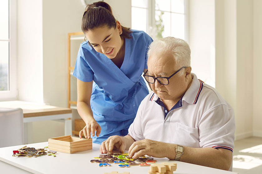 Friendly caregiver or nurse in the retirement home Friendly caregiver or nurse in the retirement home