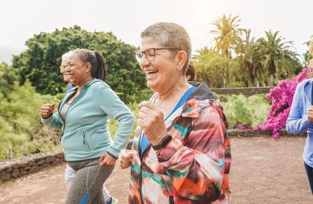 Fit,Senior,People,Running,At,City,Park,-,Group,Of