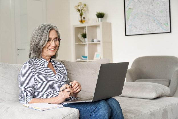 Happy,Mature,Older,Senior,Adult,Professional,Business,Woman,Working,On