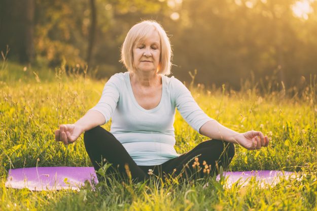 Senior-woman-enjoys-meditating