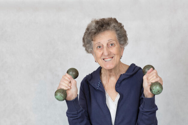 Senior woman is dressed in a sport costume